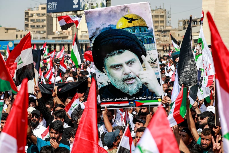 Supporters of Moqtada Al Sadr gather in Baghdad's Tahrir Square during an anti-Israel demonstration in October 2023. AFP